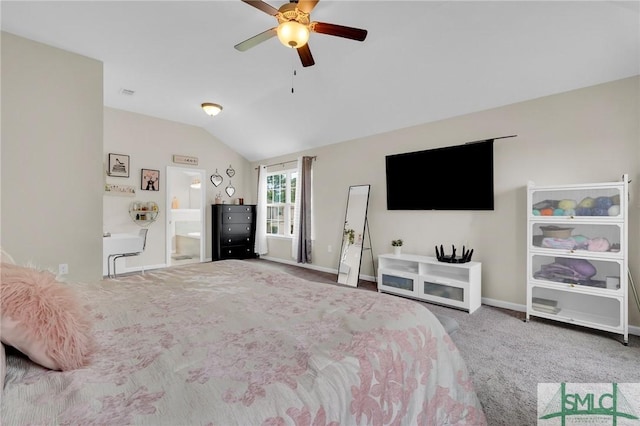 carpeted bedroom featuring ensuite bath, ceiling fan, and lofted ceiling