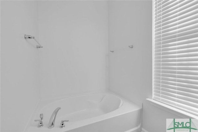 bathroom with a bathing tub