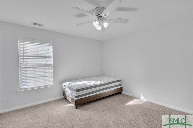 bedroom featuring carpet and ceiling fan