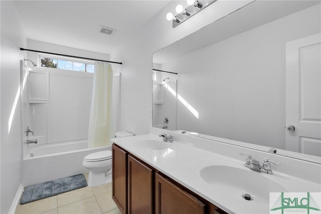 full bathroom with tile patterned floors, shower / bath combo with shower curtain, vanity, and toilet