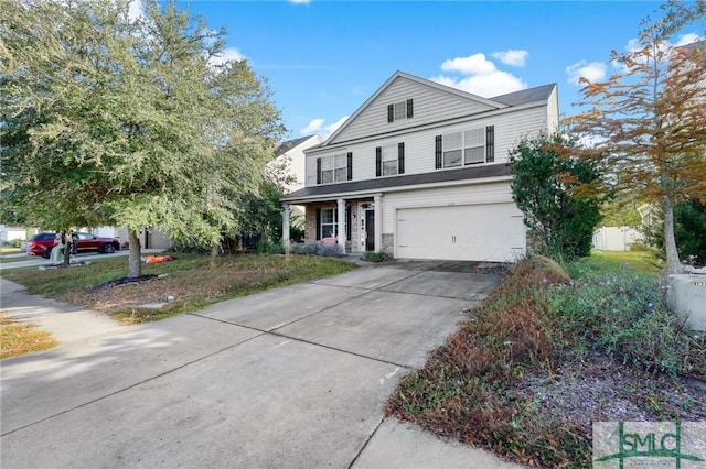 view of front of property with a garage