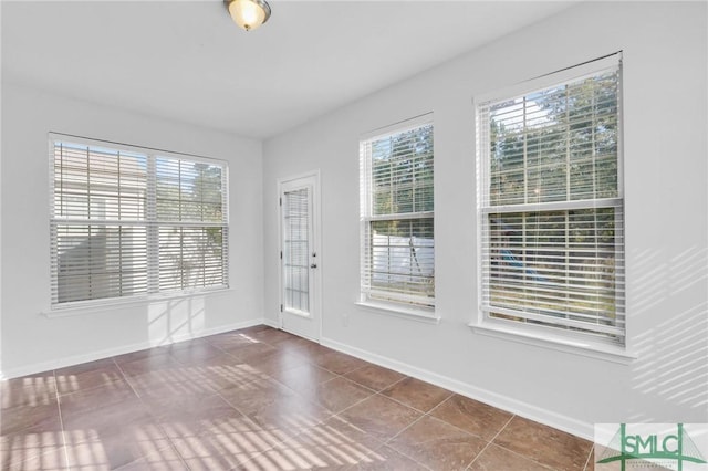 empty room featuring tile patterned flooring