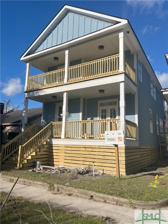 view of front facade featuring a balcony and a porch