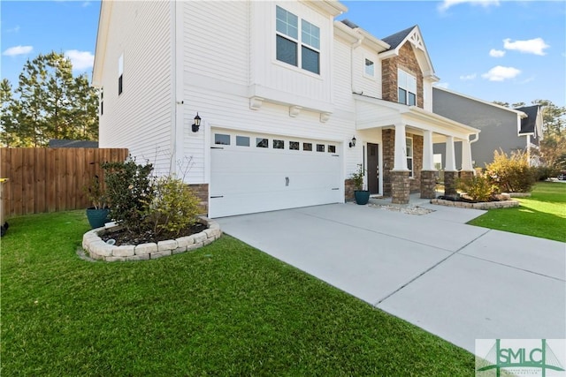 view of front facade with a front lawn and a garage