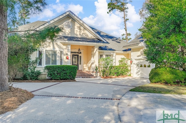 view of front of property featuring a garage