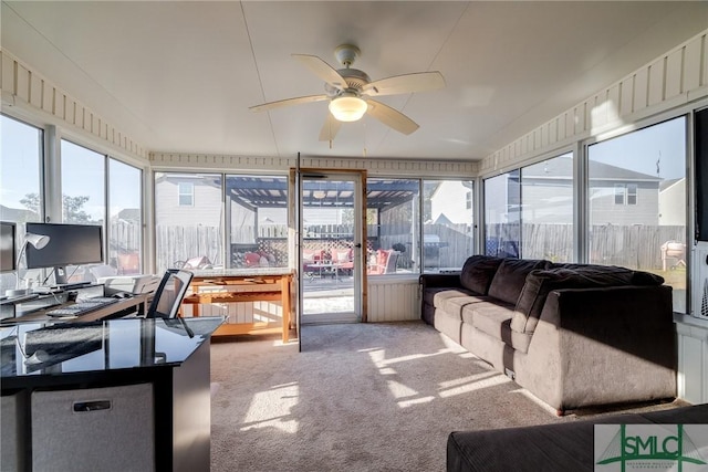 sunroom / solarium with ceiling fan