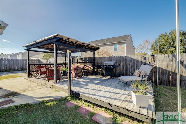 wooden terrace with a grill