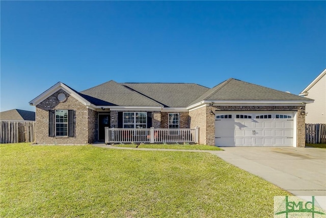 ranch-style house with a front yard and a garage