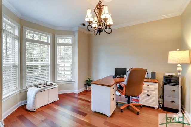 home office featuring hardwood / wood-style floors, crown molding, and a chandelier