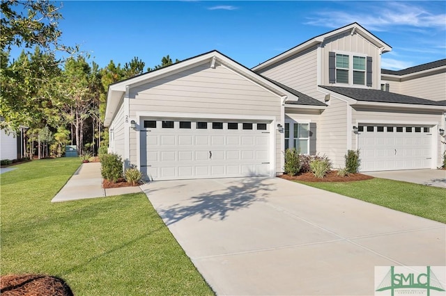 view of front facade featuring a front yard and a garage