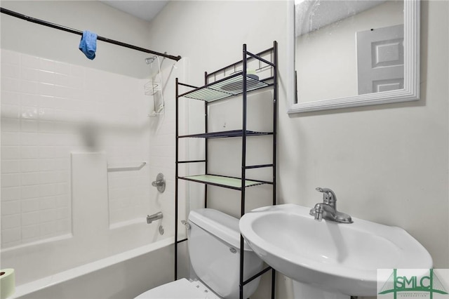 full bathroom featuring sink, toilet, and shower / bathing tub combination