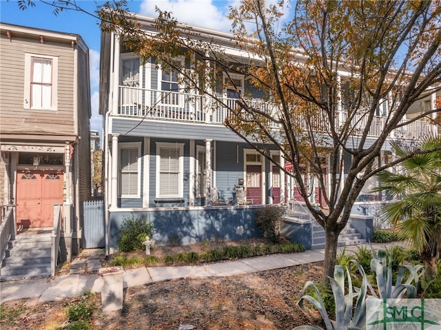 view of front of house with a balcony