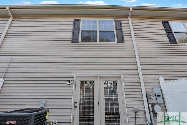 view of home's exterior with central AC