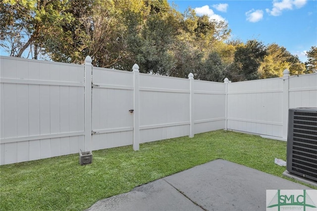 view of yard featuring central AC