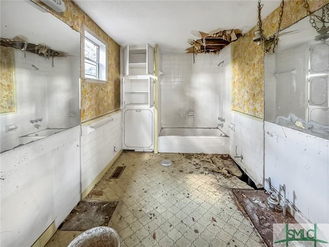 bathroom featuring a bath