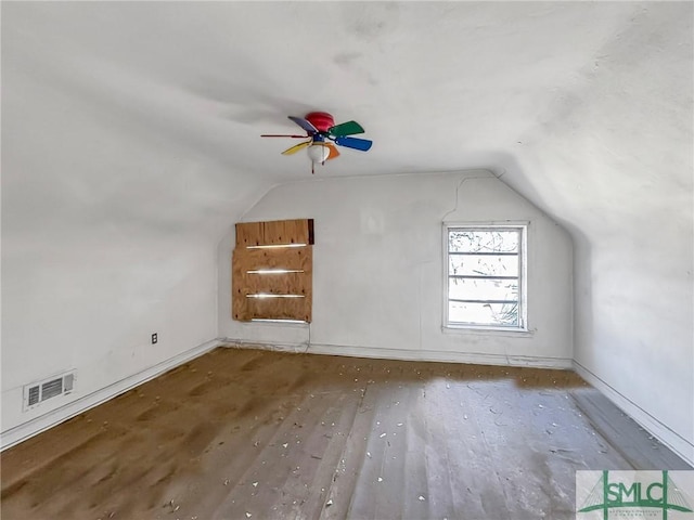 additional living space with ceiling fan and lofted ceiling