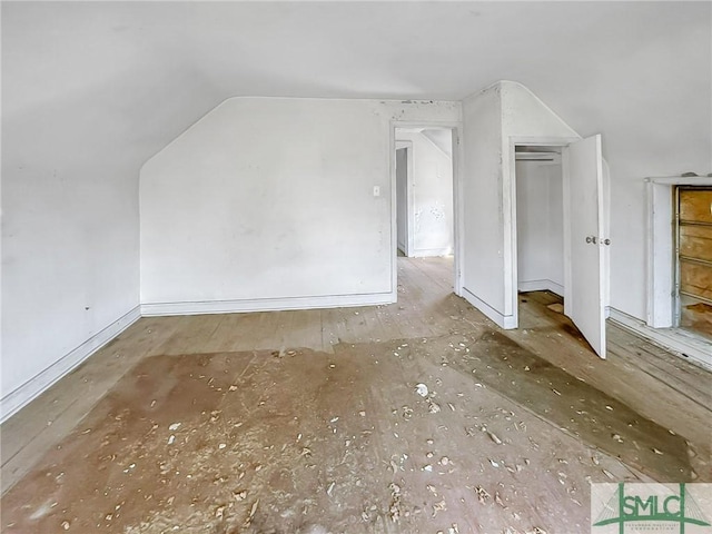 bonus room with vaulted ceiling