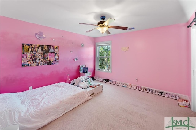 bedroom with carpet floors and ceiling fan