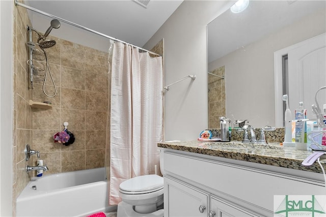 full bathroom featuring vanity, toilet, and shower / bathtub combination with curtain