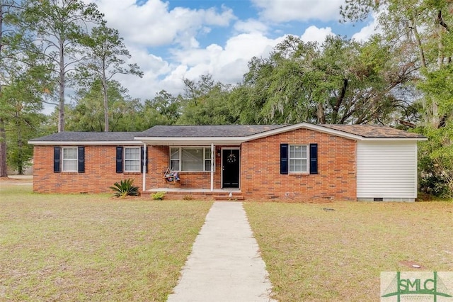 ranch-style home with a porch and a front lawn