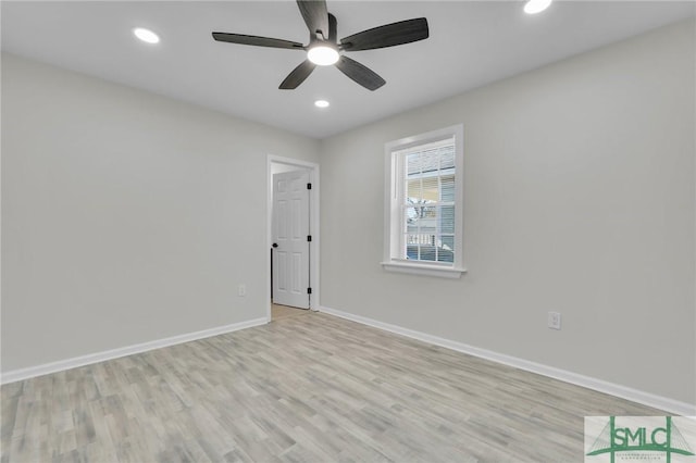 unfurnished room featuring light wood-type flooring and ceiling fan