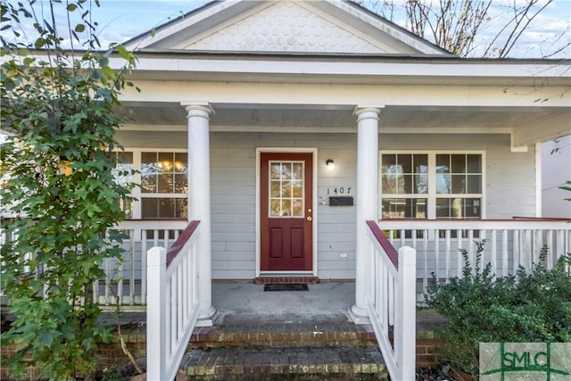 entrance to property with covered porch