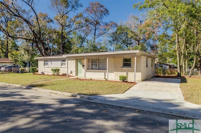 view of front of home with a front lawn