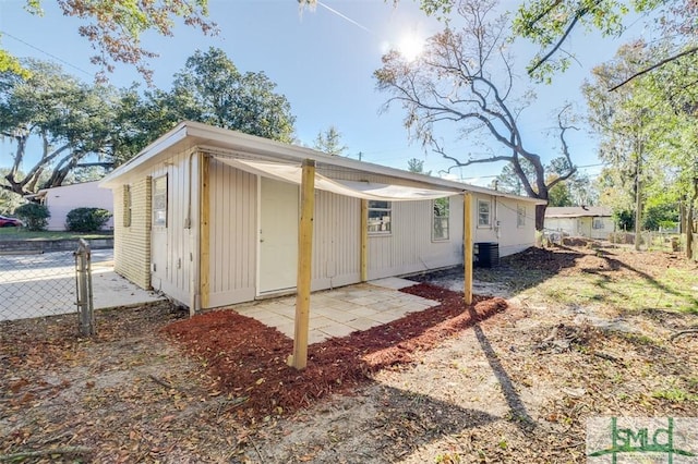 view of home's exterior with central AC unit