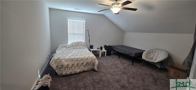 bedroom with ceiling fan, dark carpet, and vaulted ceiling