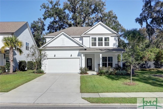 view of front facade with a front yard and a garage