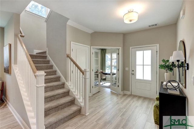 entrance foyer featuring light wood-type flooring