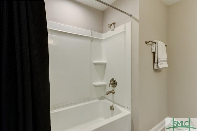 bathroom featuring washtub / shower combination