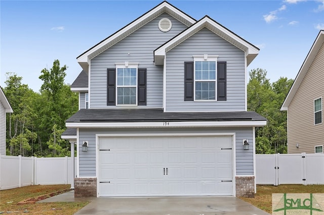 view of front of house with a garage