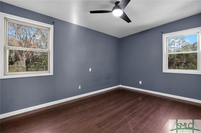 spare room featuring ceiling fan and wood-type flooring