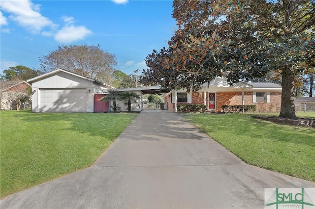 ranch-style house with a garage and a front yard