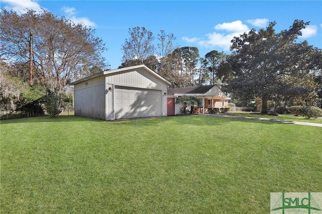 view of yard featuring a garage