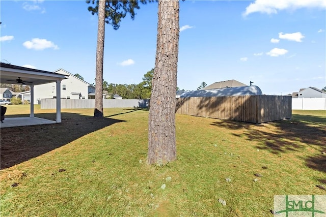 view of yard featuring ceiling fan