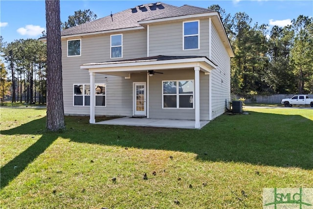 view of front facade featuring central air condition unit, a patio area, and a front lawn