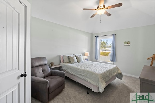 bedroom featuring ceiling fan, light carpet, and vaulted ceiling