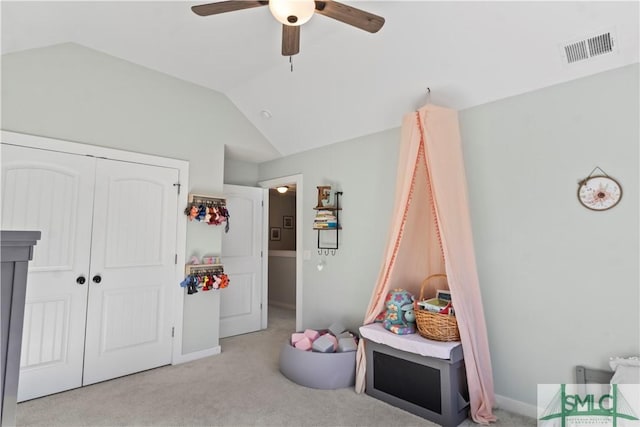 rec room with light colored carpet, vaulted ceiling, and ceiling fan