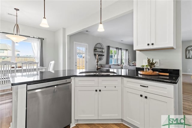 kitchen featuring sink, pendant lighting, light hardwood / wood-style flooring, dishwasher, and white cabinetry