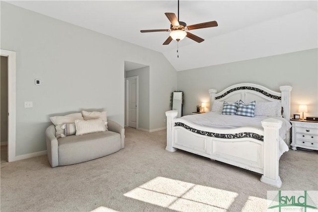 bedroom featuring ceiling fan, light colored carpet, and lofted ceiling