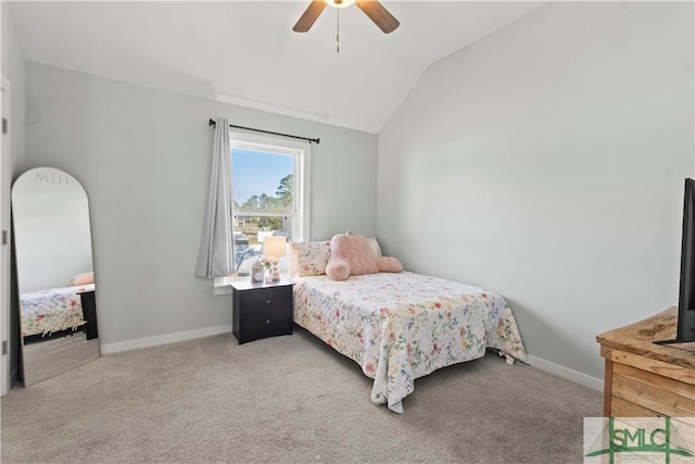 bedroom with ceiling fan, light colored carpet, and lofted ceiling