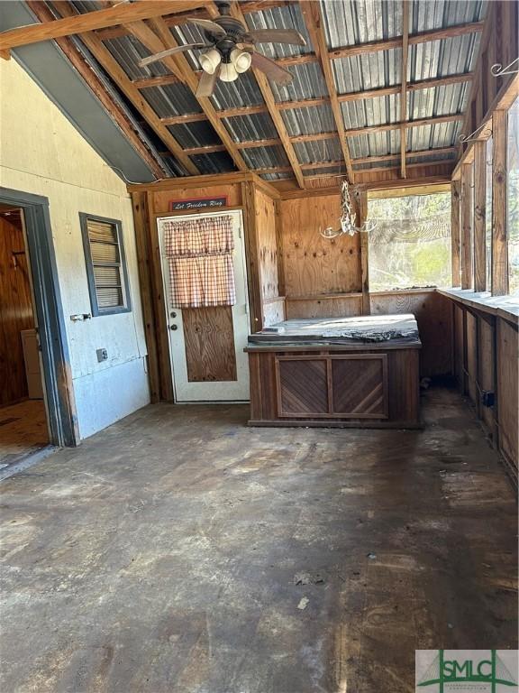 miscellaneous room with vaulted ceiling and ceiling fan