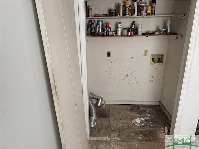 laundry room with hookup for an electric dryer and hookup for a washing machine