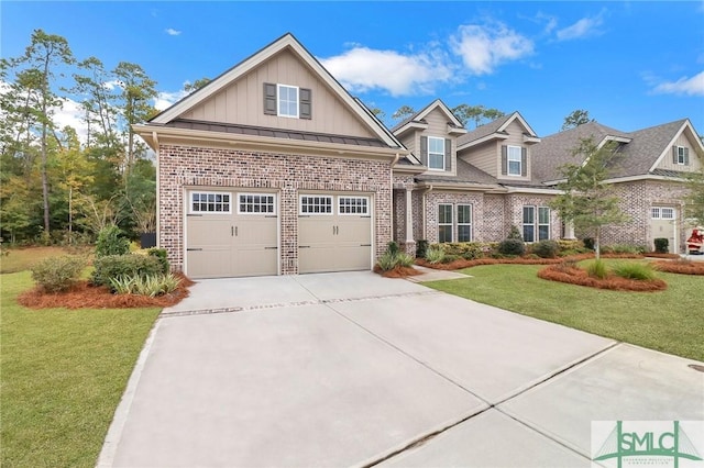 craftsman house with a garage and a front lawn