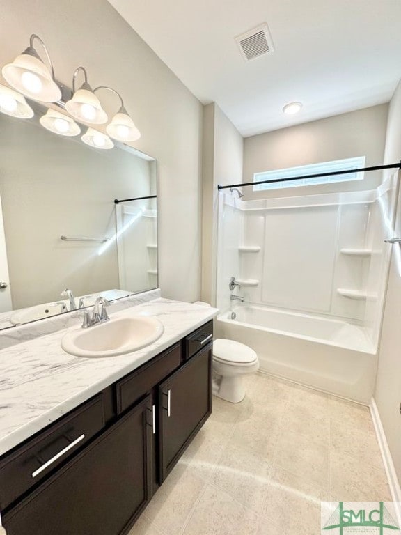 bathroom with visible vents, baseboards, toilet, shower / bathtub combination, and vanity