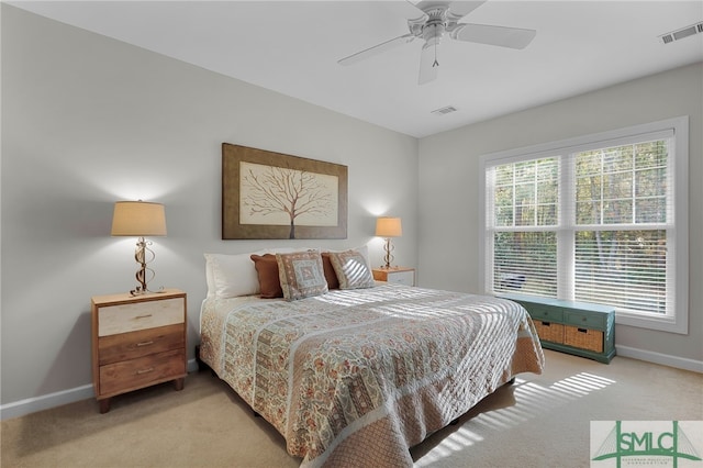 carpeted bedroom featuring ceiling fan