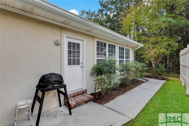 28 Turning Leaf Way, Savannah, GA 31419 - property entrance featuring stucco siding