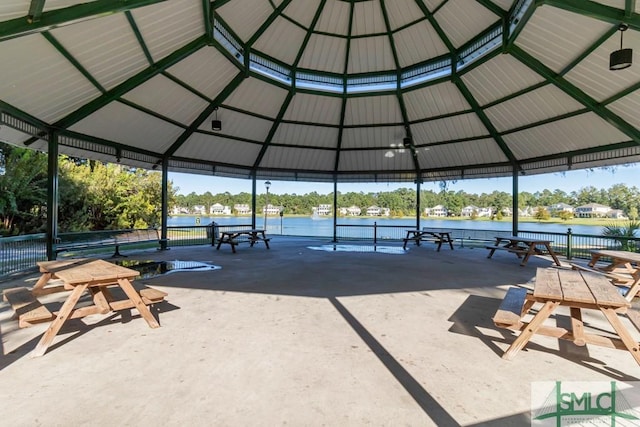 view of community featuring a gazebo and a water view